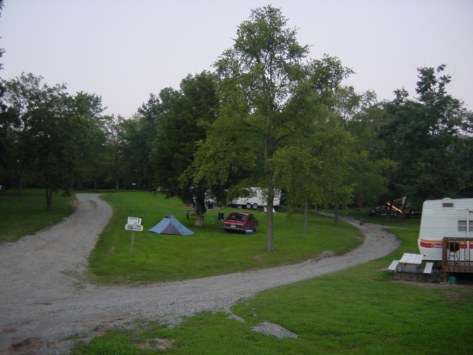 Tent, Tree, Car, and Cooler